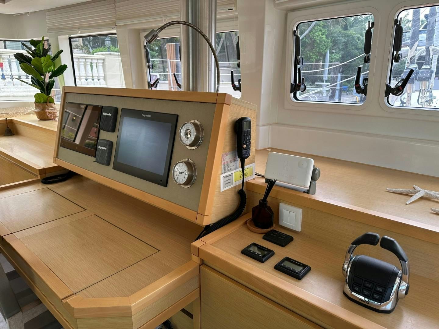 a computer on a desk aboard OCEAN VIEW Yacht for Sale