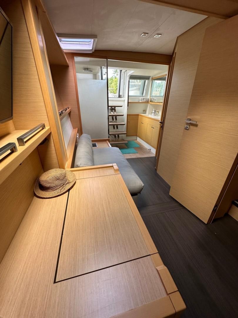 a room with a couch and a table aboard OCEAN VIEW Yacht for Sale