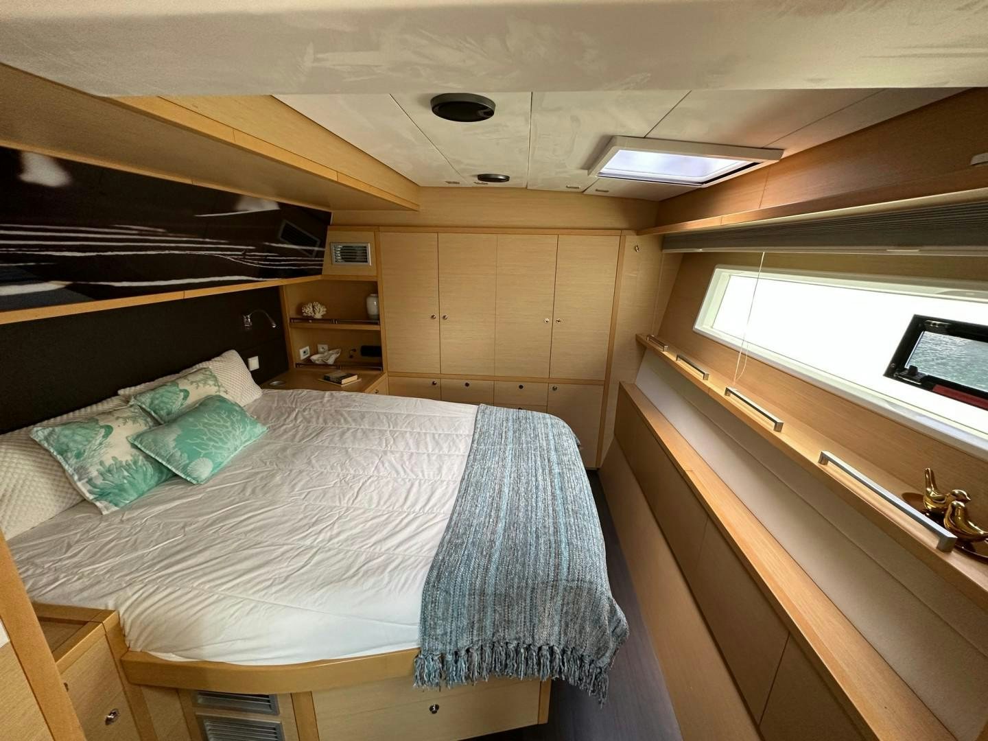 a bed in a cabin aboard OCEAN VIEW Yacht for Sale