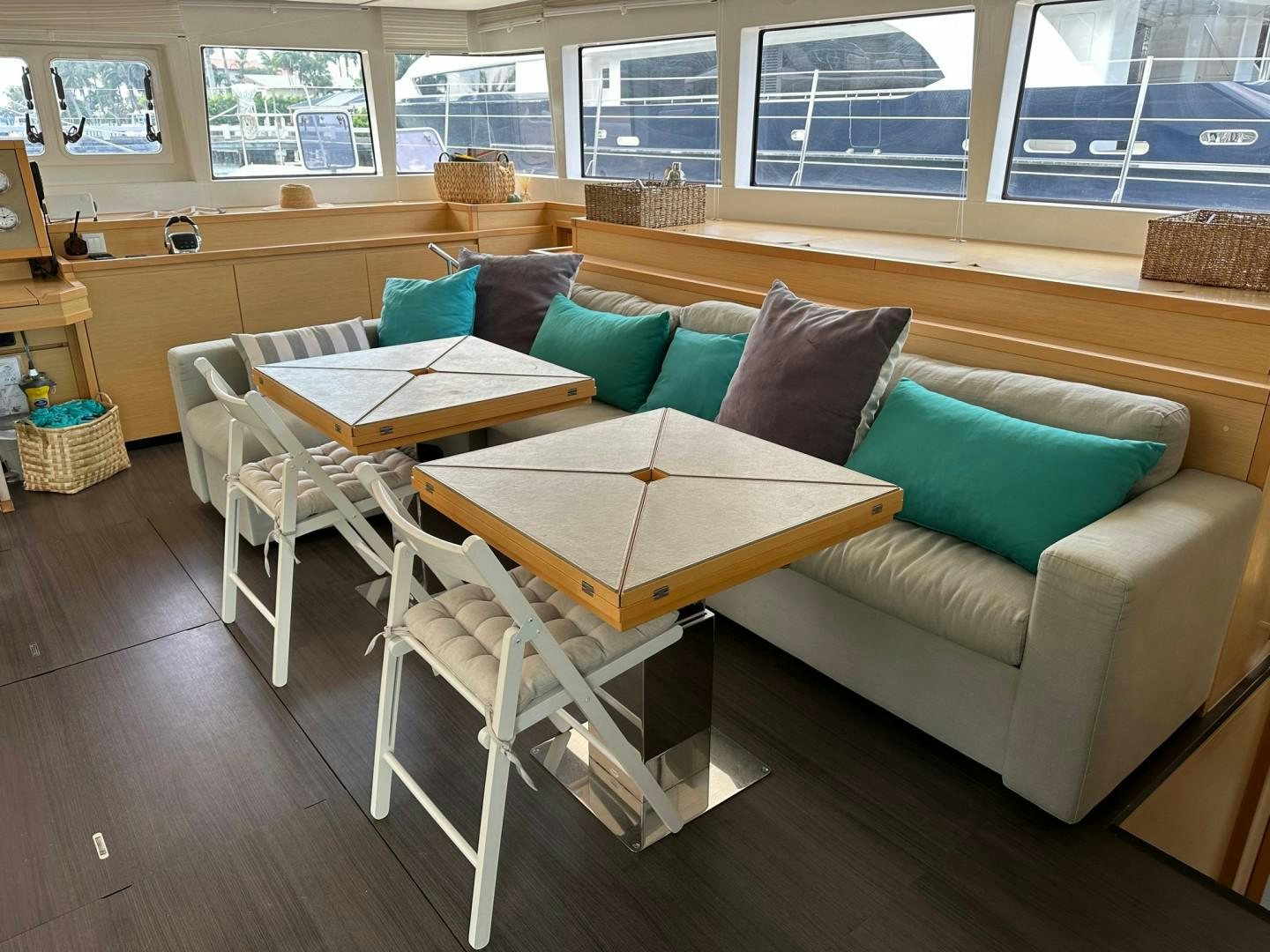 a couch and a table in a room aboard OCEAN VIEW Yacht for Sale