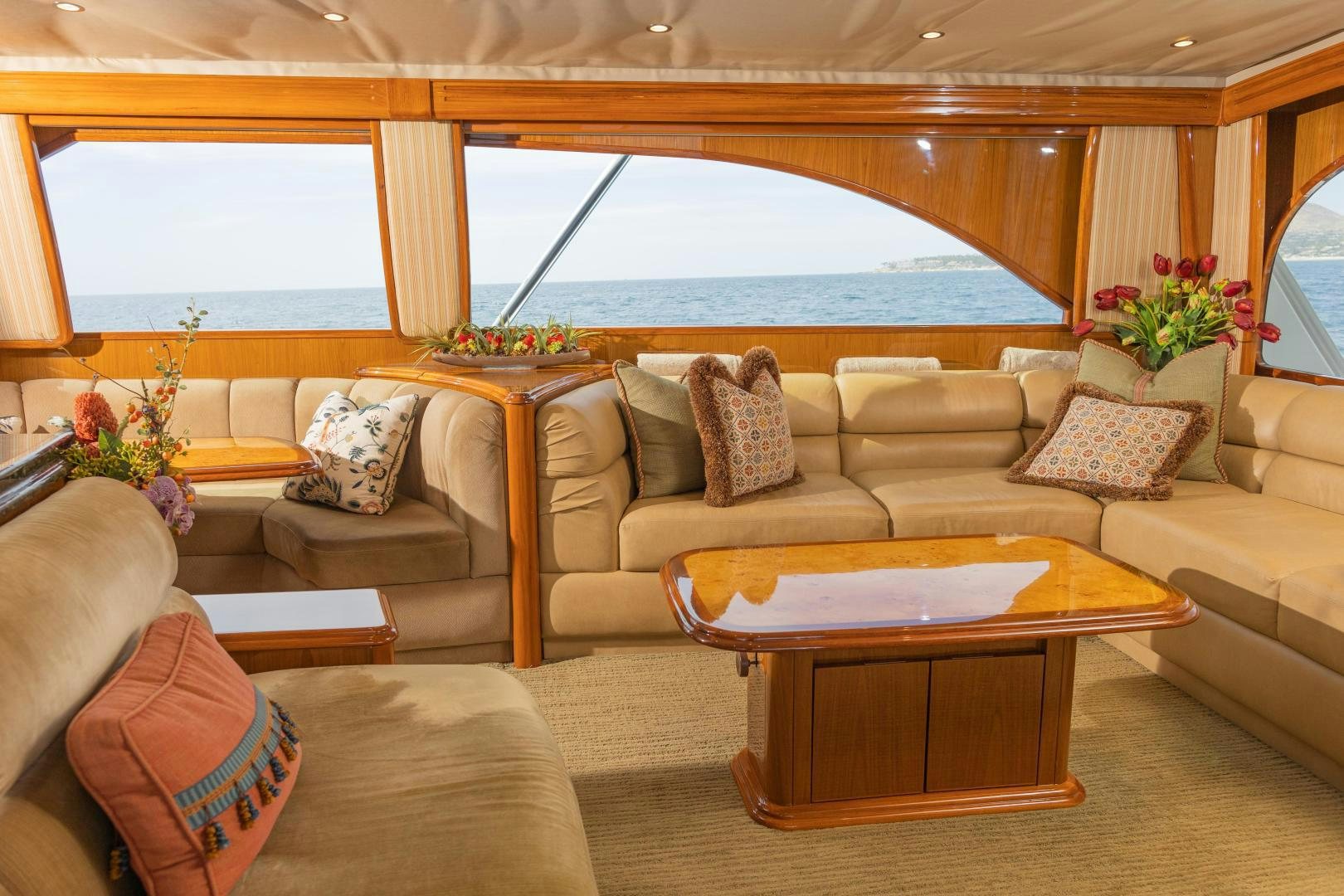 a living room with a large window aboard MOONDANCER Yacht for Sale