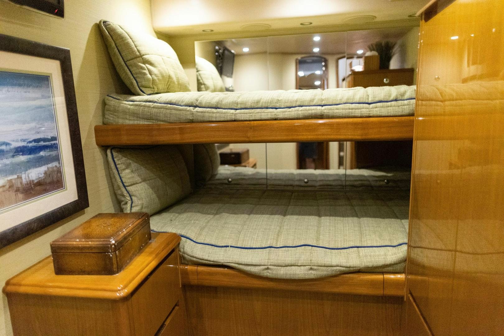 a bed with a white sheet aboard MOONDANCER Yacht for Sale
