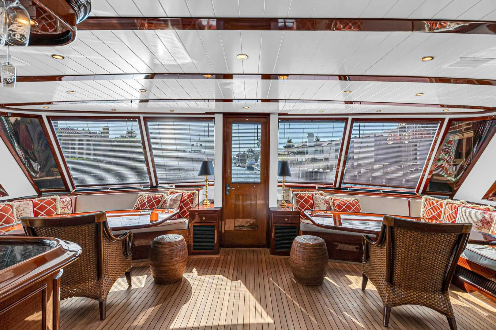 a room with a wood floor and a wood door aboard INEVITABLE Yacht for Sale