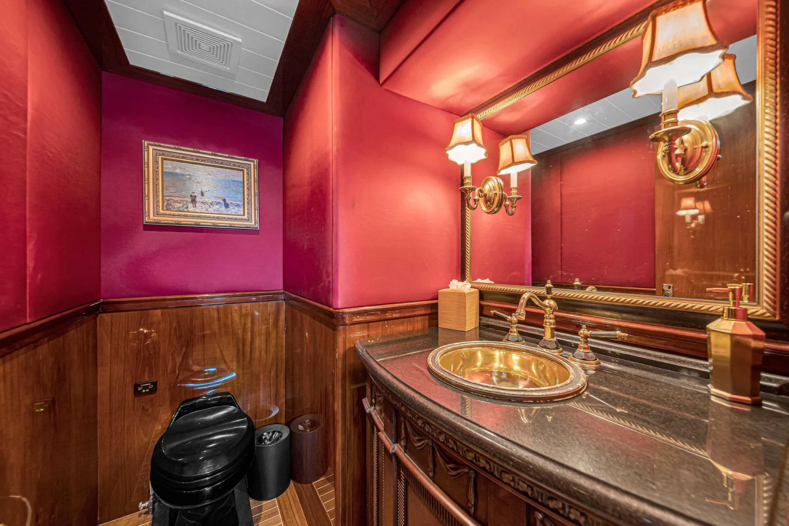 a bathroom with a sink and a mirror aboard INEVITABLE Yacht for Sale