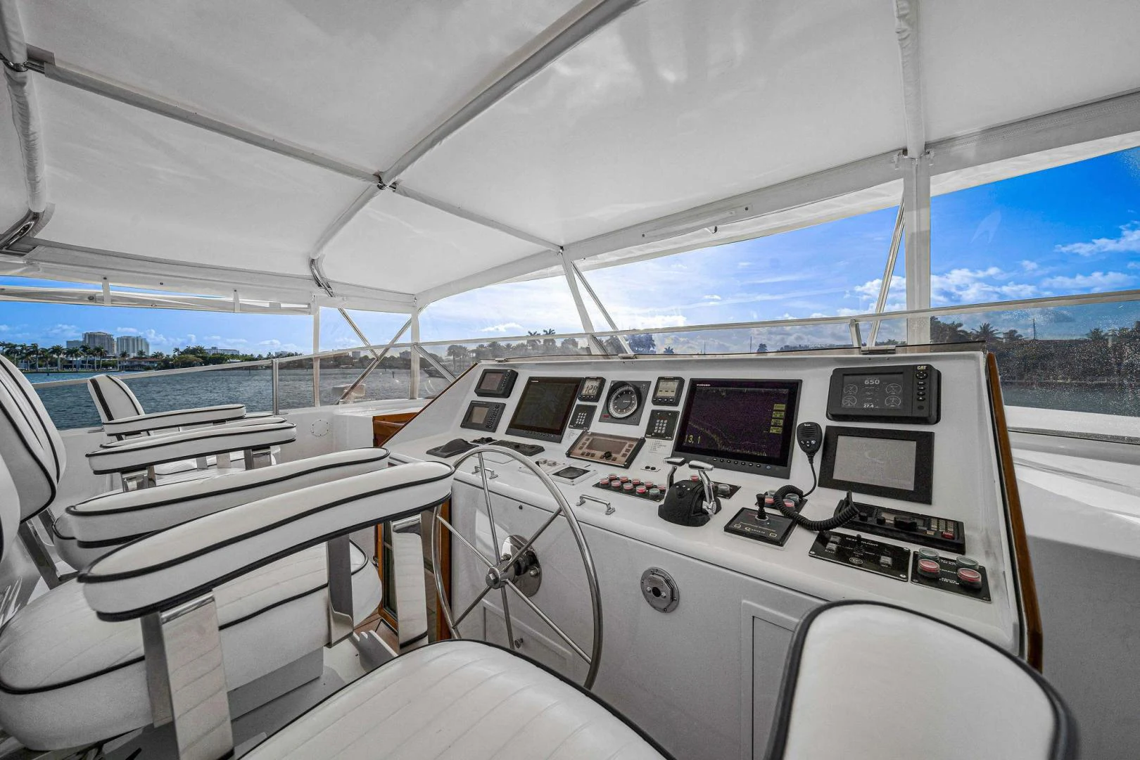 inside of a white car aboard INEVITABLE Yacht for Sale