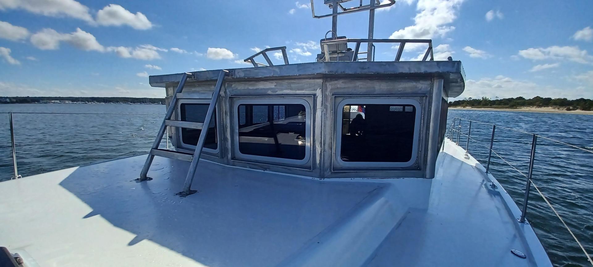 a boat on a body of water aboard TARA Yacht for Sale