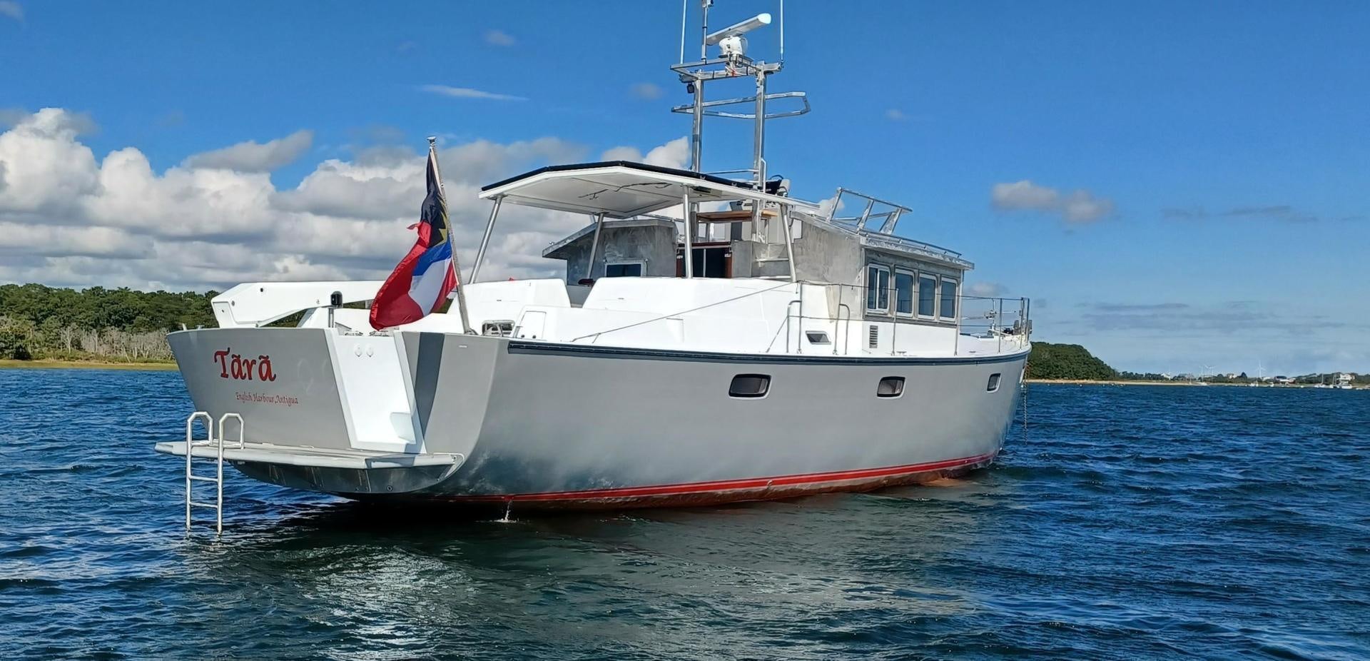 a boat on the water aboard TARA Yacht for Sale