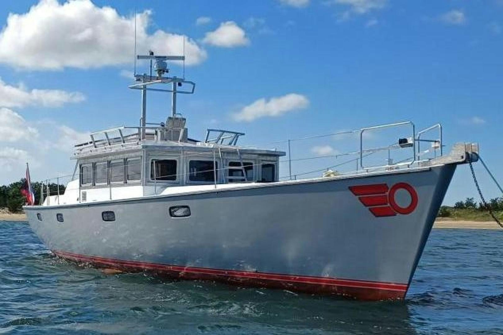 a boat in the water aboard TARA Yacht for Sale