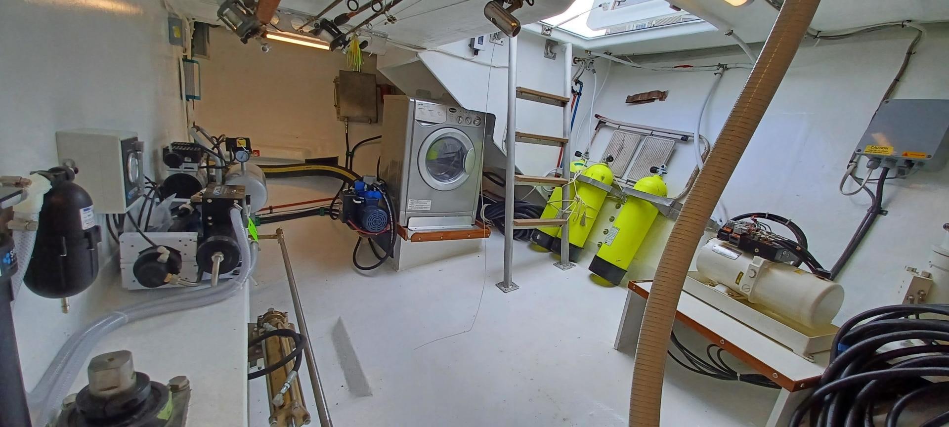 a room with equipment and tools aboard TARA Yacht for Sale