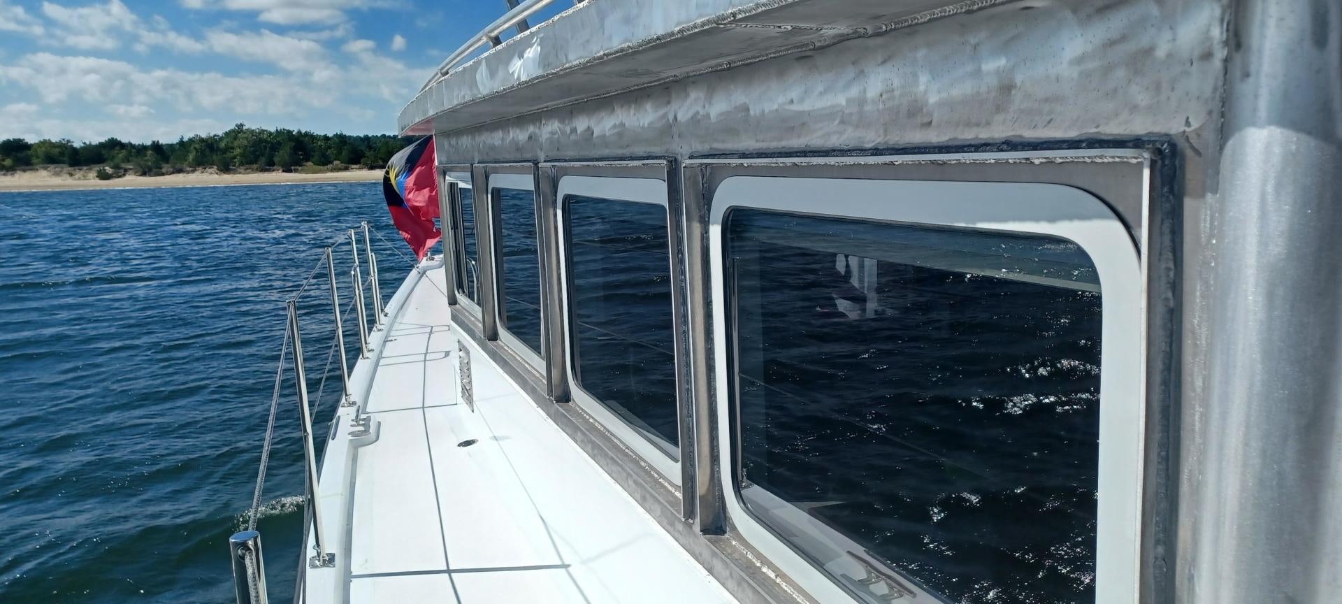 a boat on the water aboard TARA Yacht for Sale