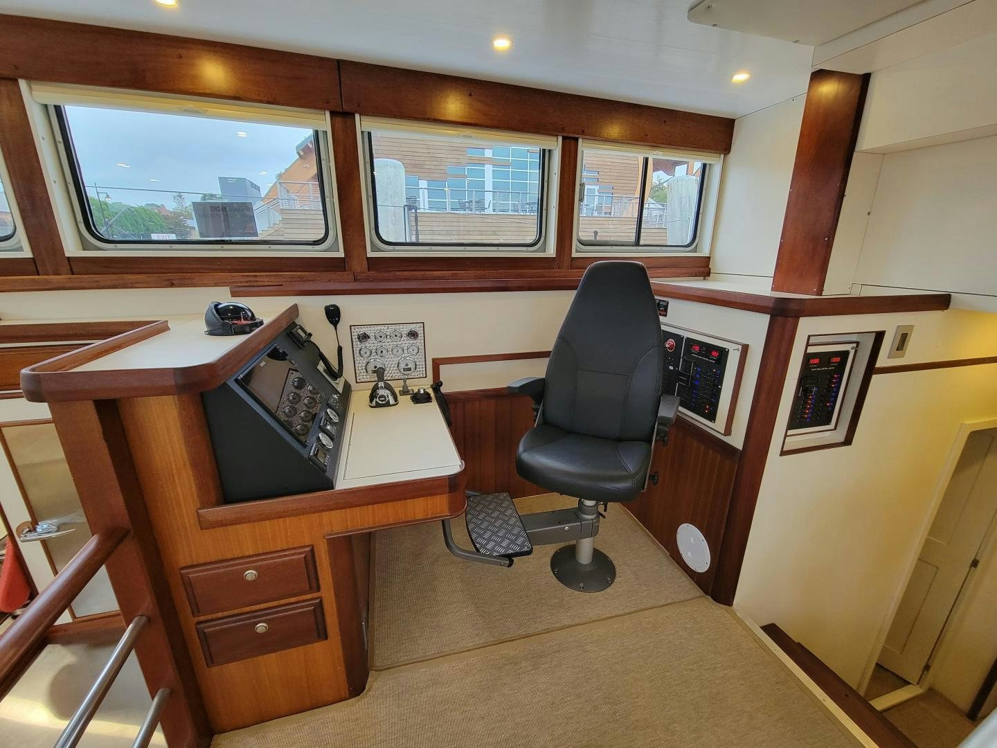 a room with a desk and chair aboard TARA Yacht for Sale