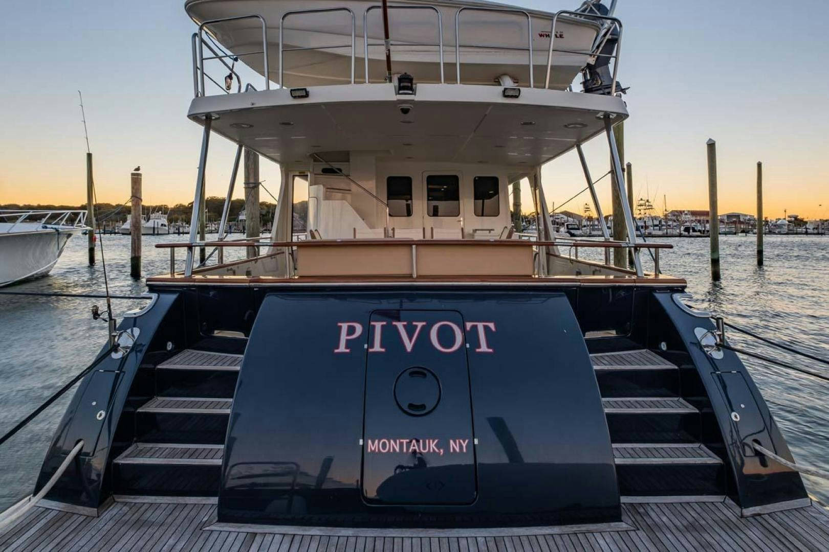 a boat on a dock aboard PIVOT Yacht for Sale