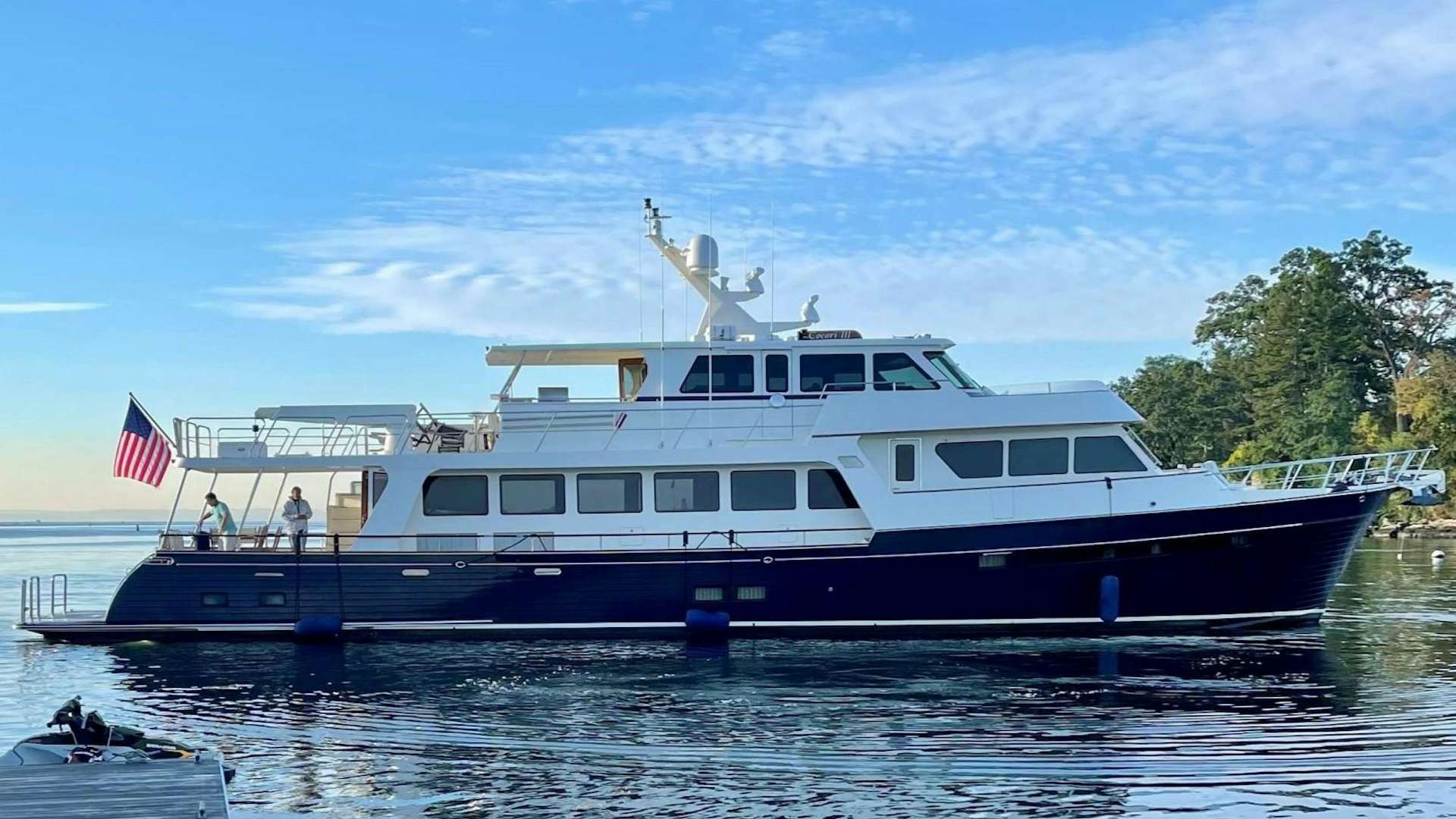 a large boat on the water aboard PIVOT Yacht for Sale