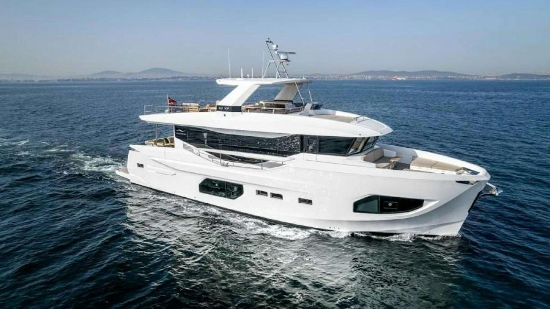 a white yacht in the water aboard NUMARINE 22XP HULL 7 Yacht for Sale