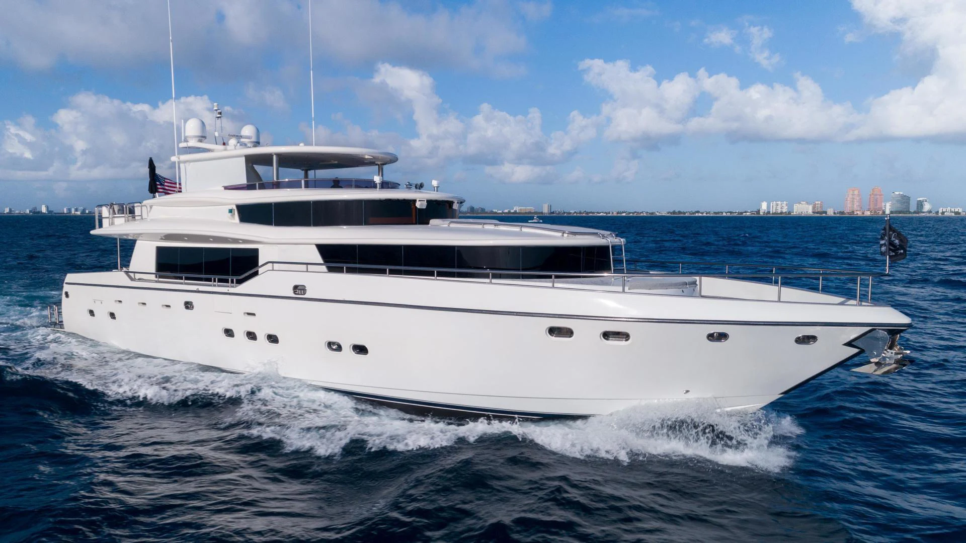 a white yacht on the water aboard NEVER SETTLE Yacht for Sale