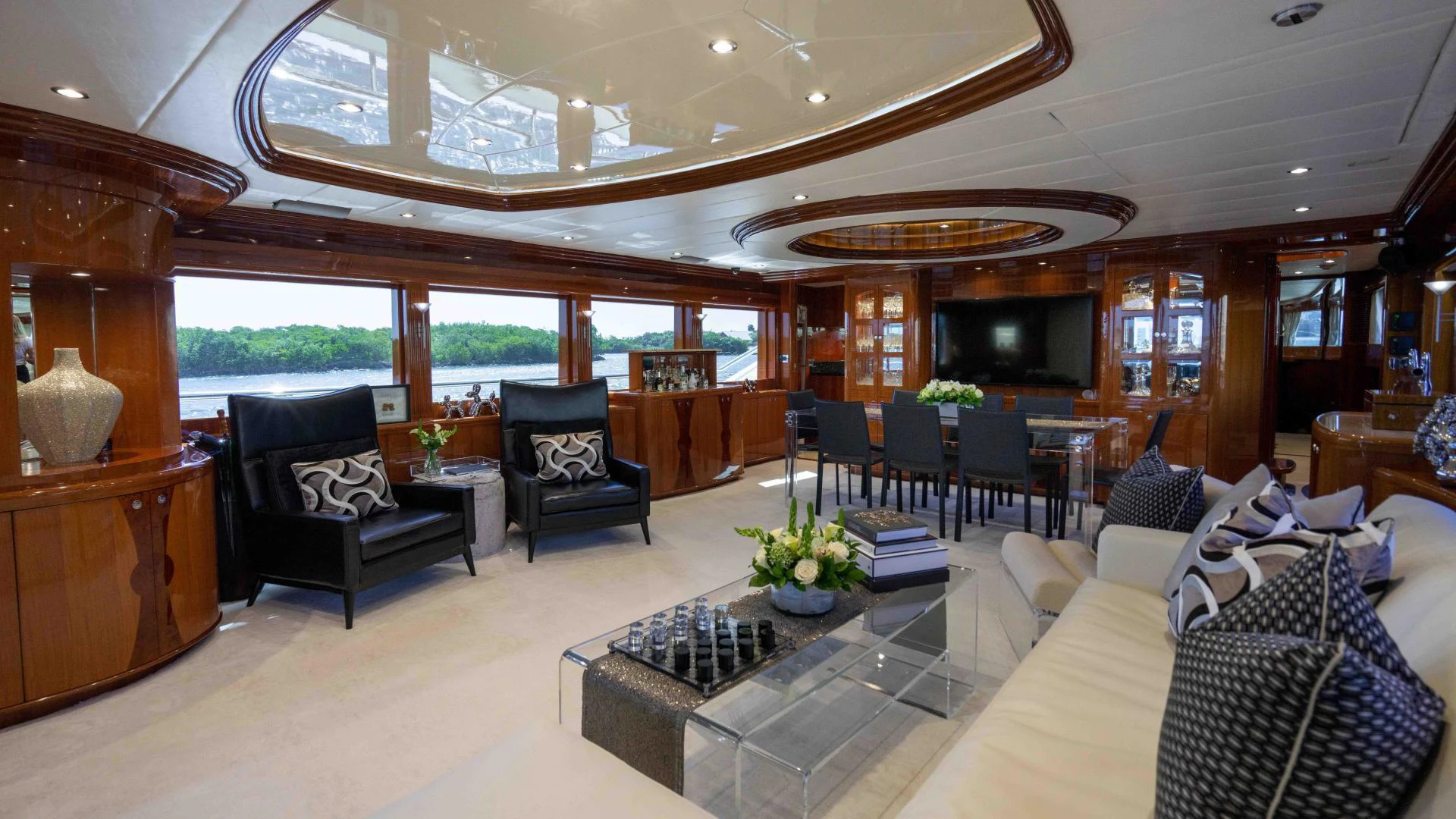 a living room with a large window aboard NEVER SETTLE Yacht for Sale