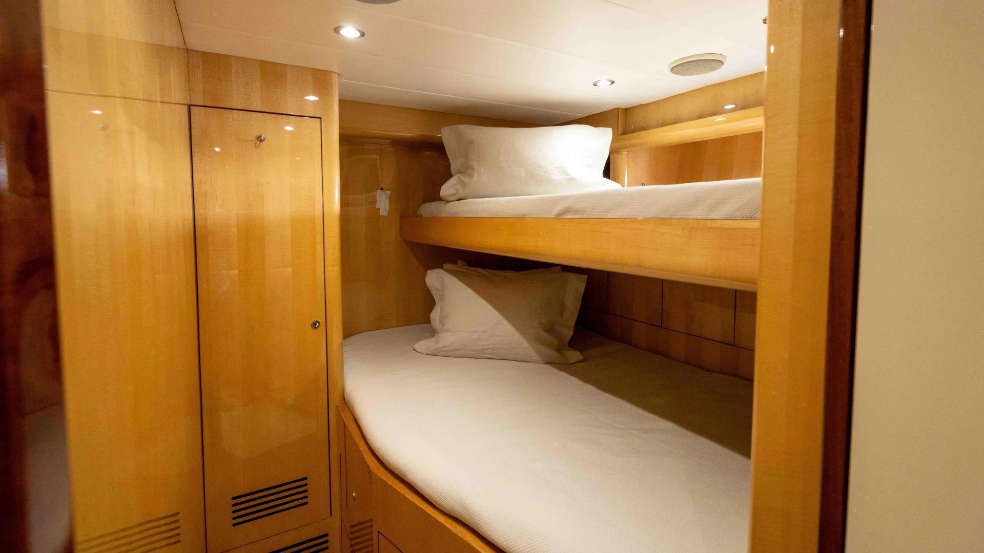 a room with bunk beds aboard NEVER SETTLE Yacht for Sale
