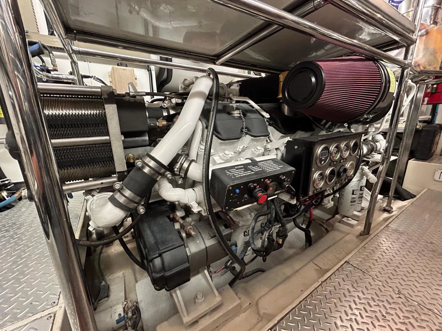 a close-up of a car engine aboard NEVER SETTLE Yacht for Sale
