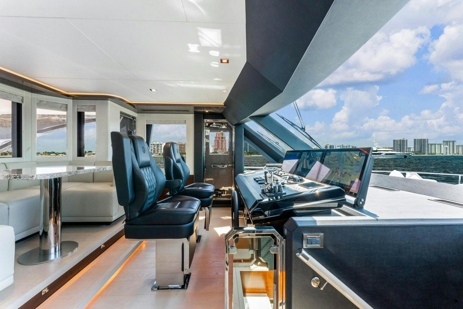 inside of a vehicle with a view of the city aboard LIVING LIFE Yacht for Sale