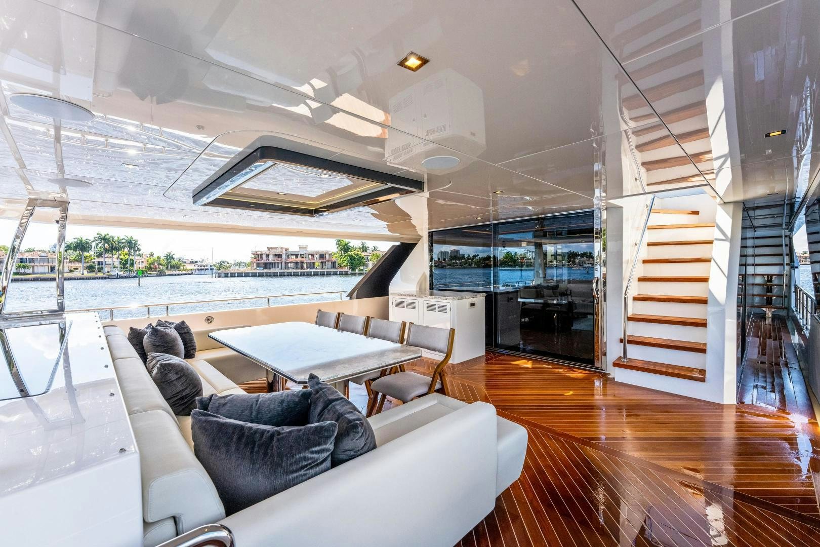 a living room with a large glass window aboard LIVING LIFE Yacht for Sale