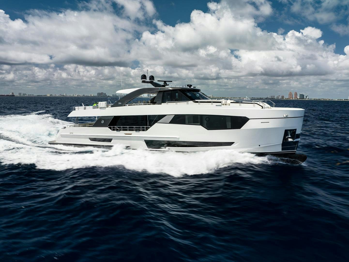 a white boat on water aboard LIVING LIFE Yacht for Sale