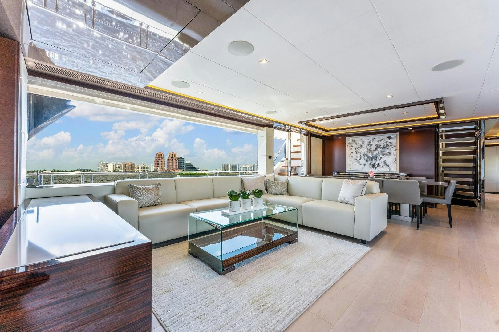 a living room with a large window aboard LIVING LIFE Yacht for Sale