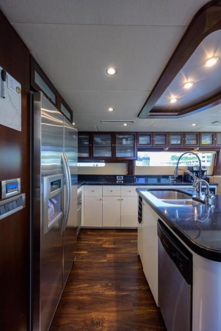 a kitchen with a stainless steel sink aboard GYPSEA Yacht for Sale
