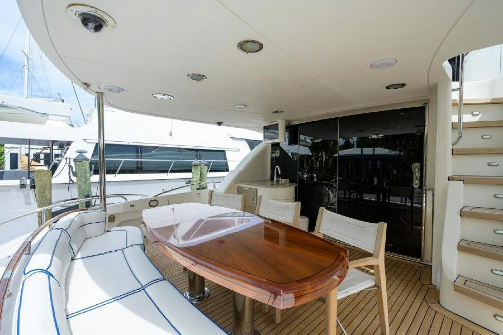 a room with a table and chairs aboard GYPSEA Yacht for Sale
