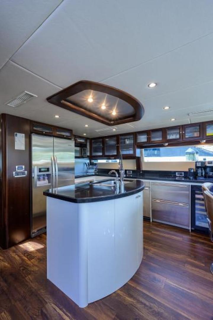 a kitchen with a large island aboard GYPSEA Yacht for Sale