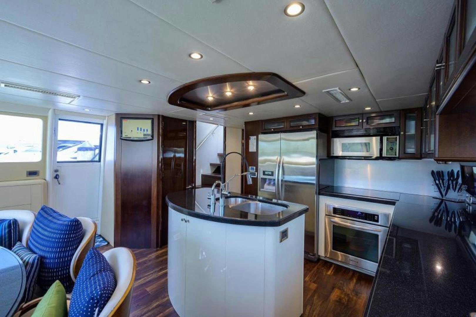 a kitchen with a sink and stove aboard GYPSEA Yacht for Sale
