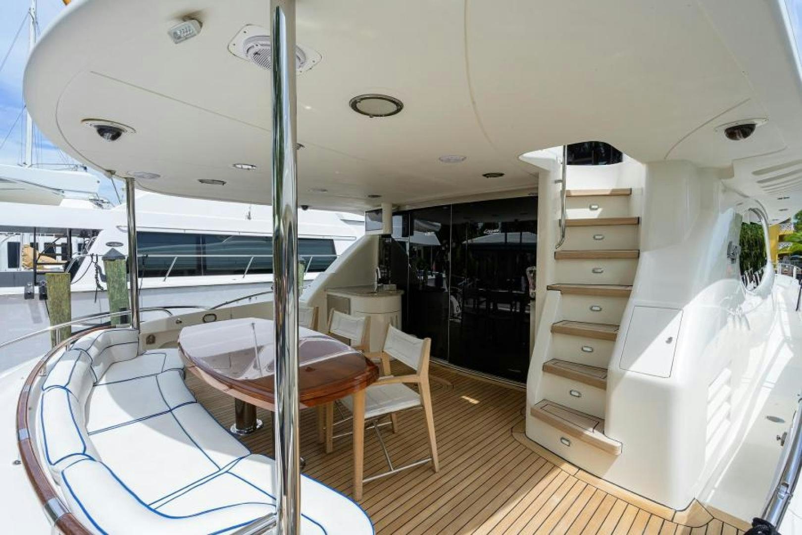 a room with a table and chairs aboard GYPSEA Yacht for Sale