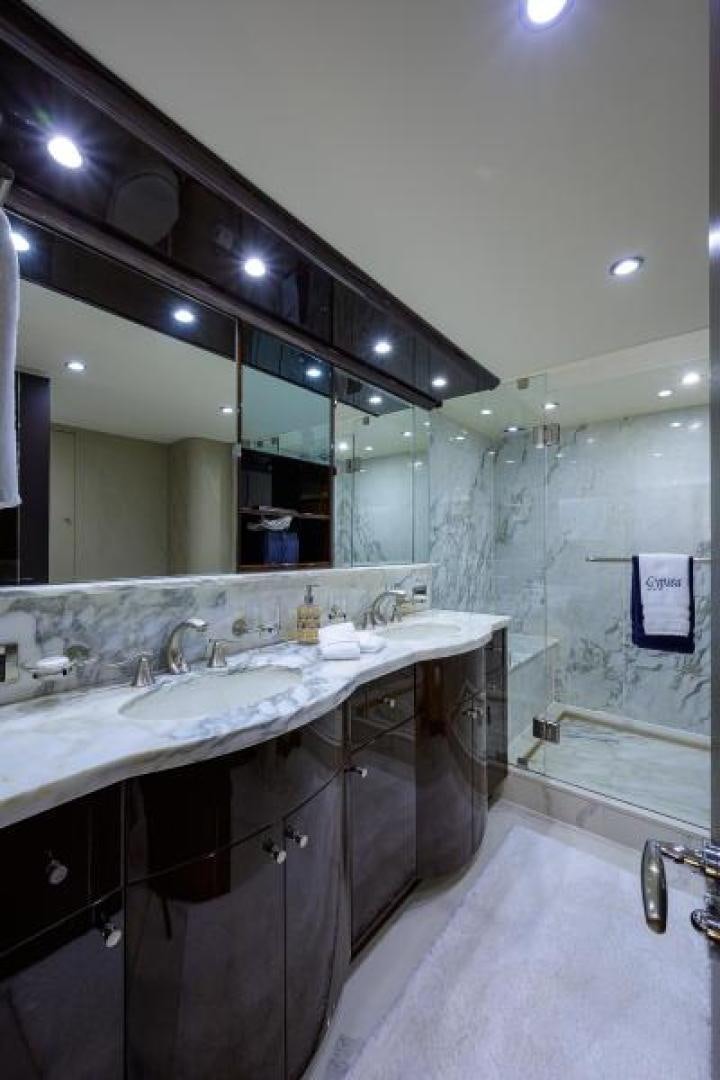 a bathroom with a large mirror aboard GYPSEA Yacht for Sale