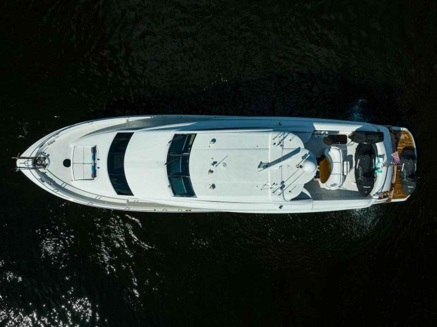 a white rectangular object with a black and white logo on it aboard GYPSEA Yacht for Sale