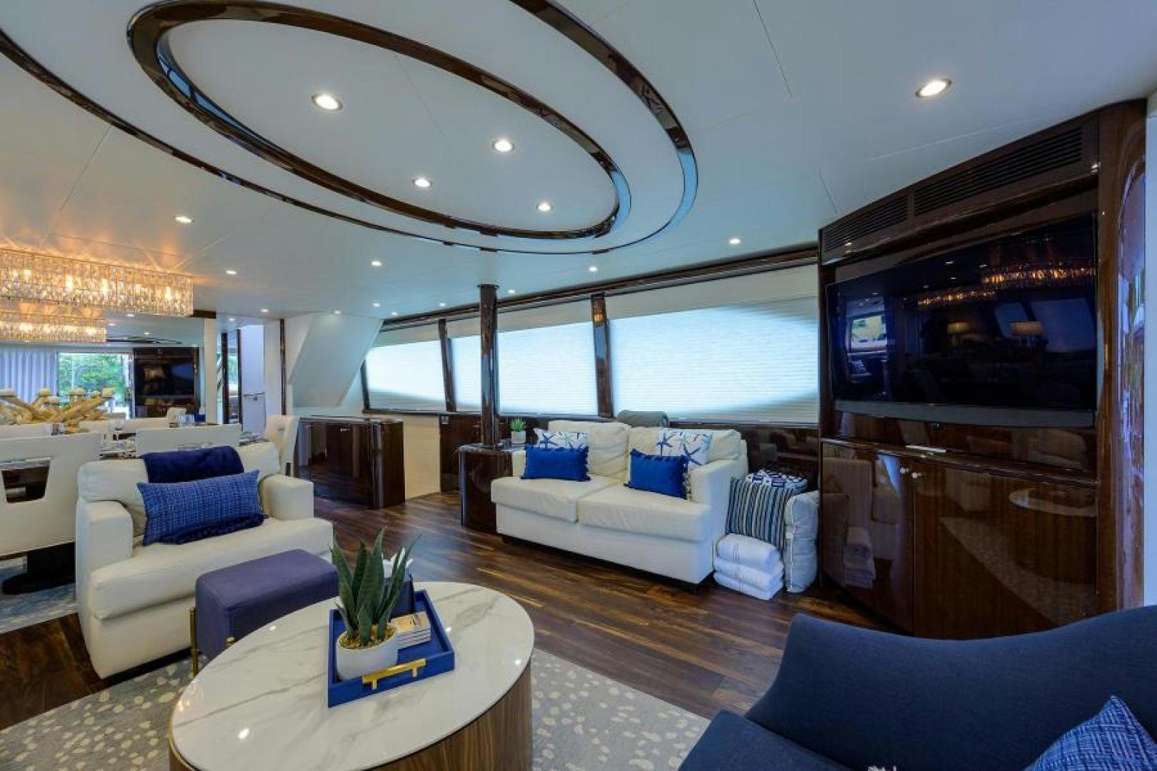 a living room with a large window aboard GYPSEA Yacht for Sale