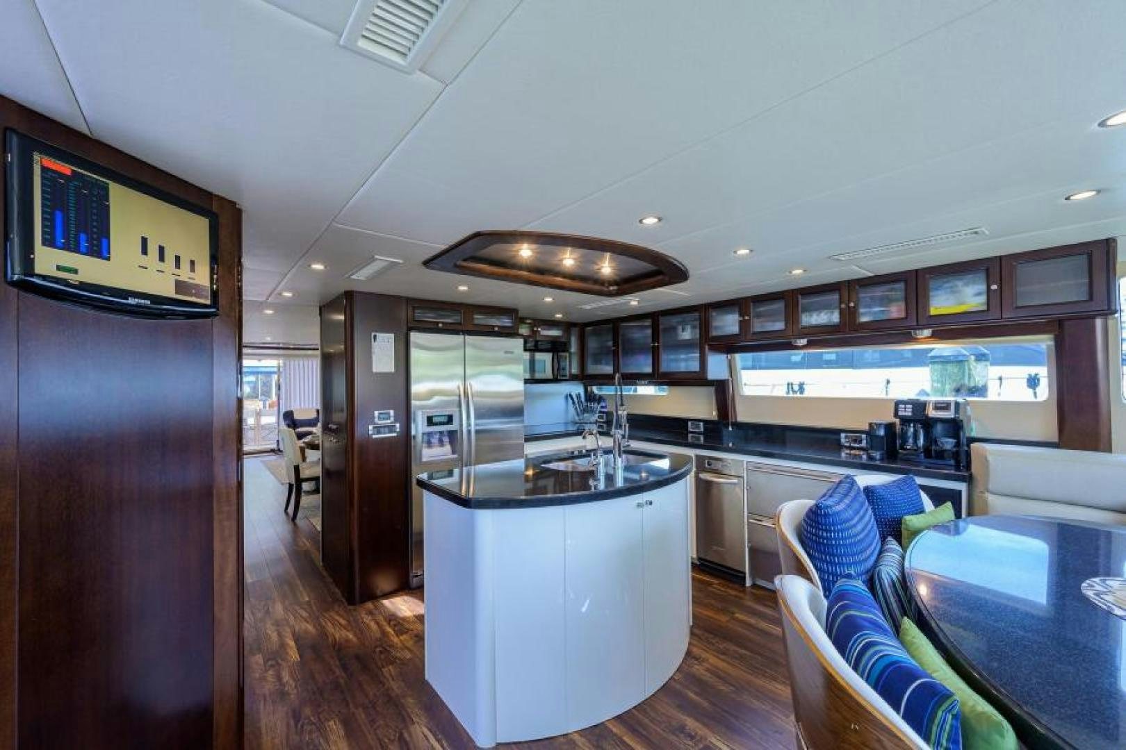 a kitchen with a large refrigerator aboard GYPSEA Yacht for Sale
