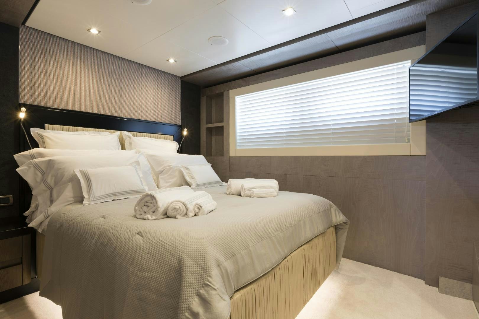 a room with a bed and a window aboard FRANCESCA Yacht for Sale