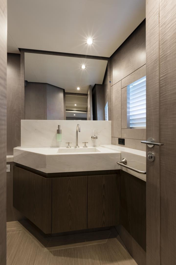 a bathroom with a sink and a mirror aboard FRANCESCA Yacht for Sale