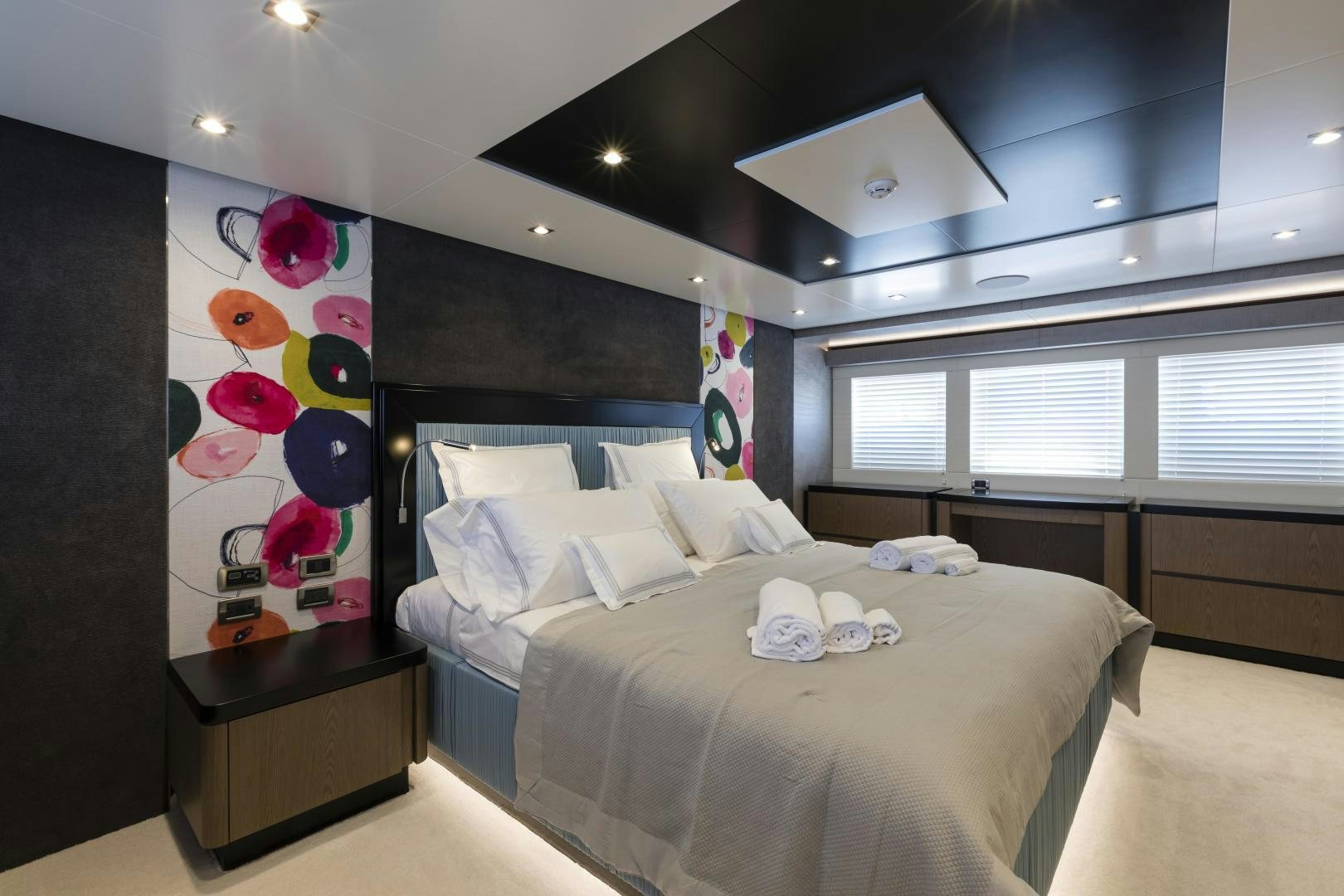 a bedroom with a bed and a balloon aboard FRANCESCA Yacht for Sale