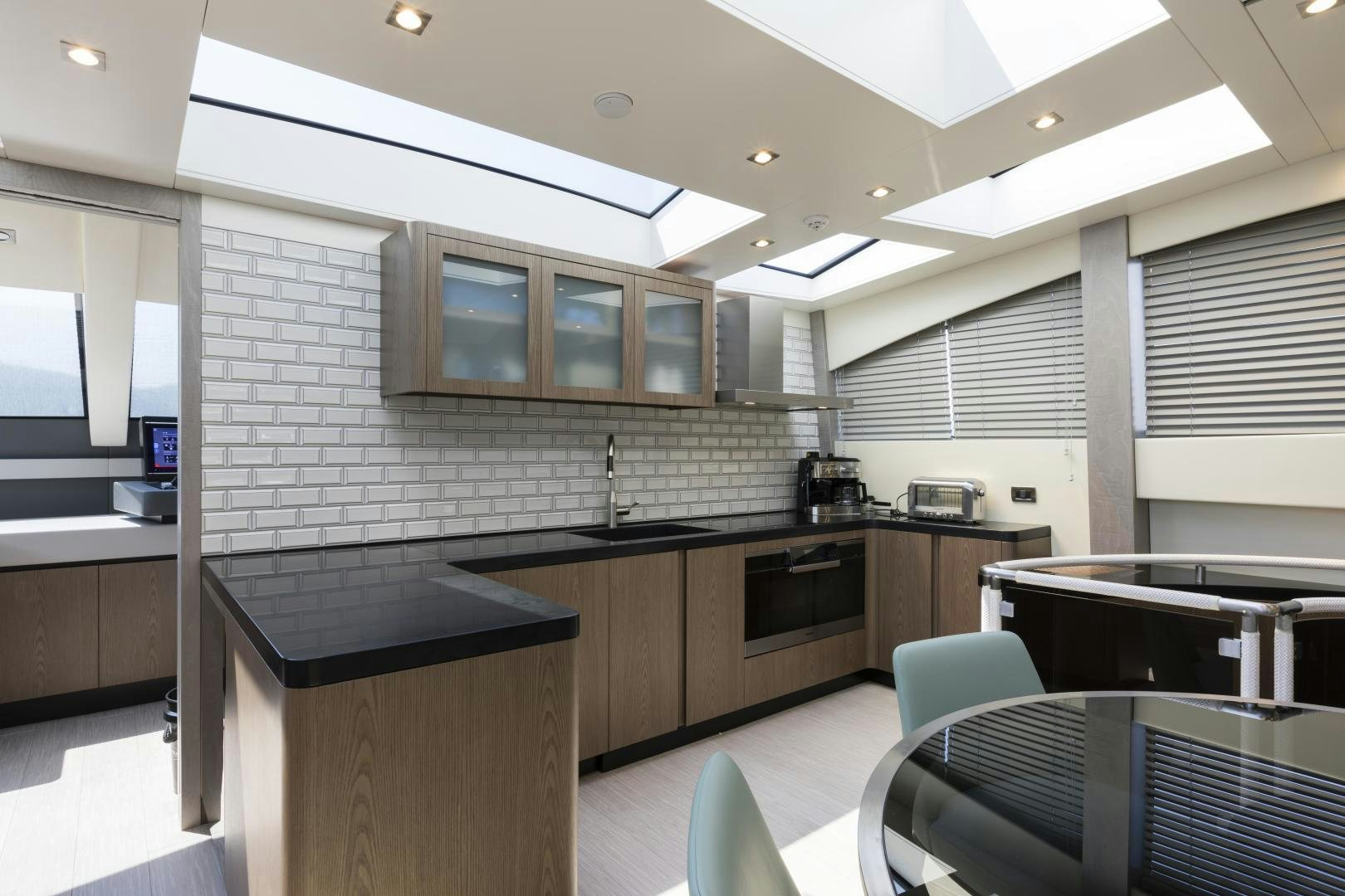 a kitchen with a large island aboard FRANCESCA Yacht for Sale