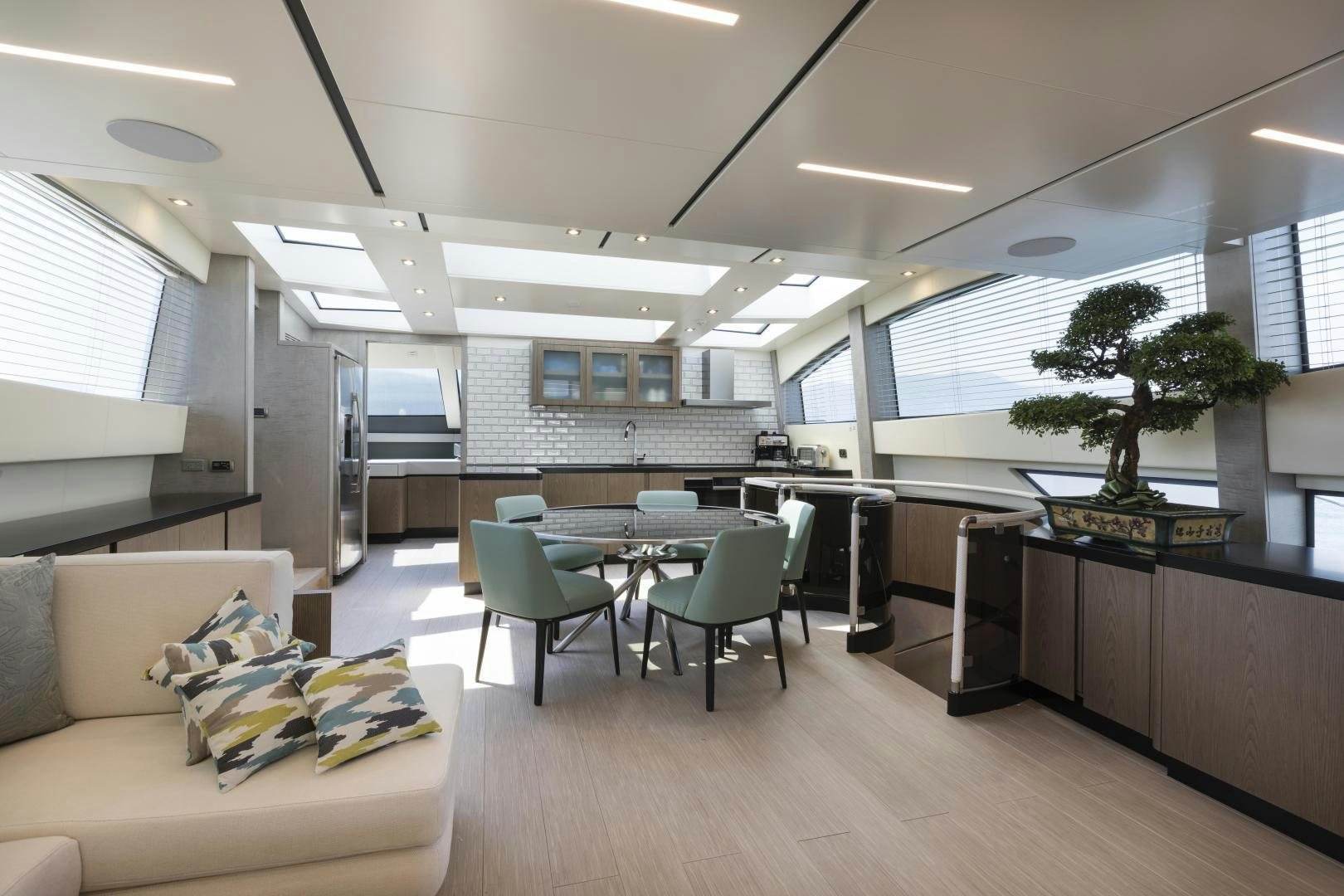 a room with a table and chairs aboard FRANCESCA Yacht for Sale