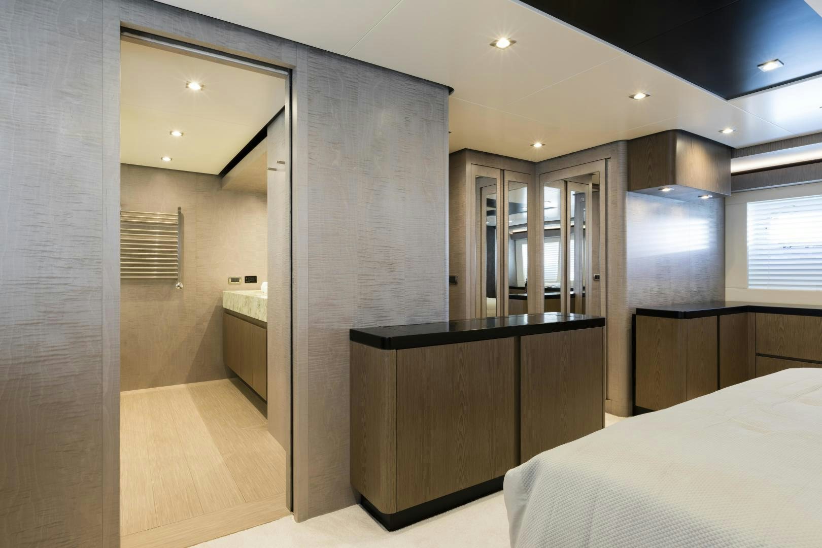 a room with a bed and a desk aboard FRANCESCA Yacht for Sale