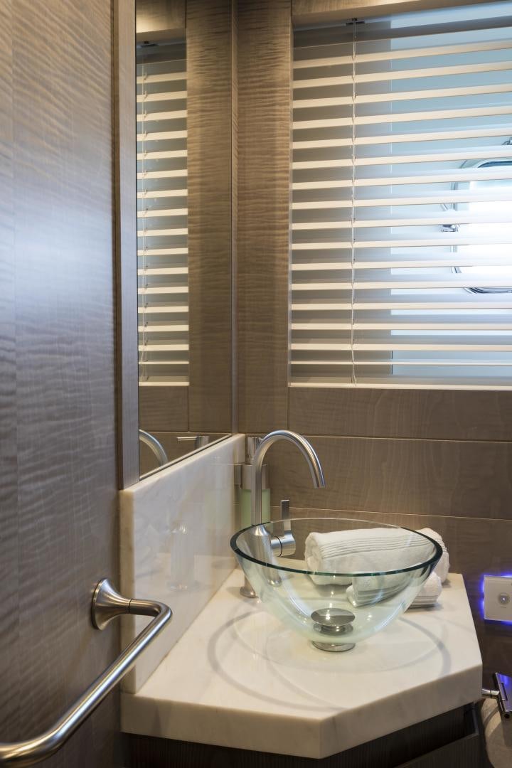 a bathroom sink with a glass bowl aboard FRANCESCA Yacht for Sale