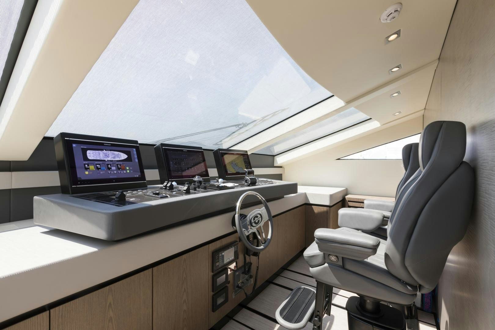 a desk with a computer and a chair aboard FRANCESCA Yacht for Sale
