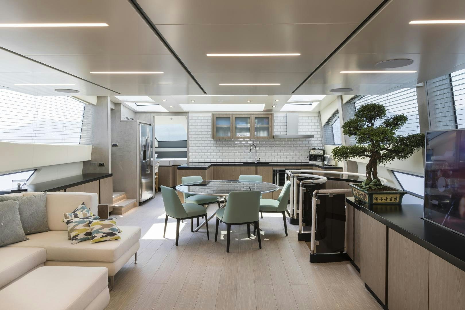 a room with a table and chairs aboard FRANCESCA Yacht for Sale