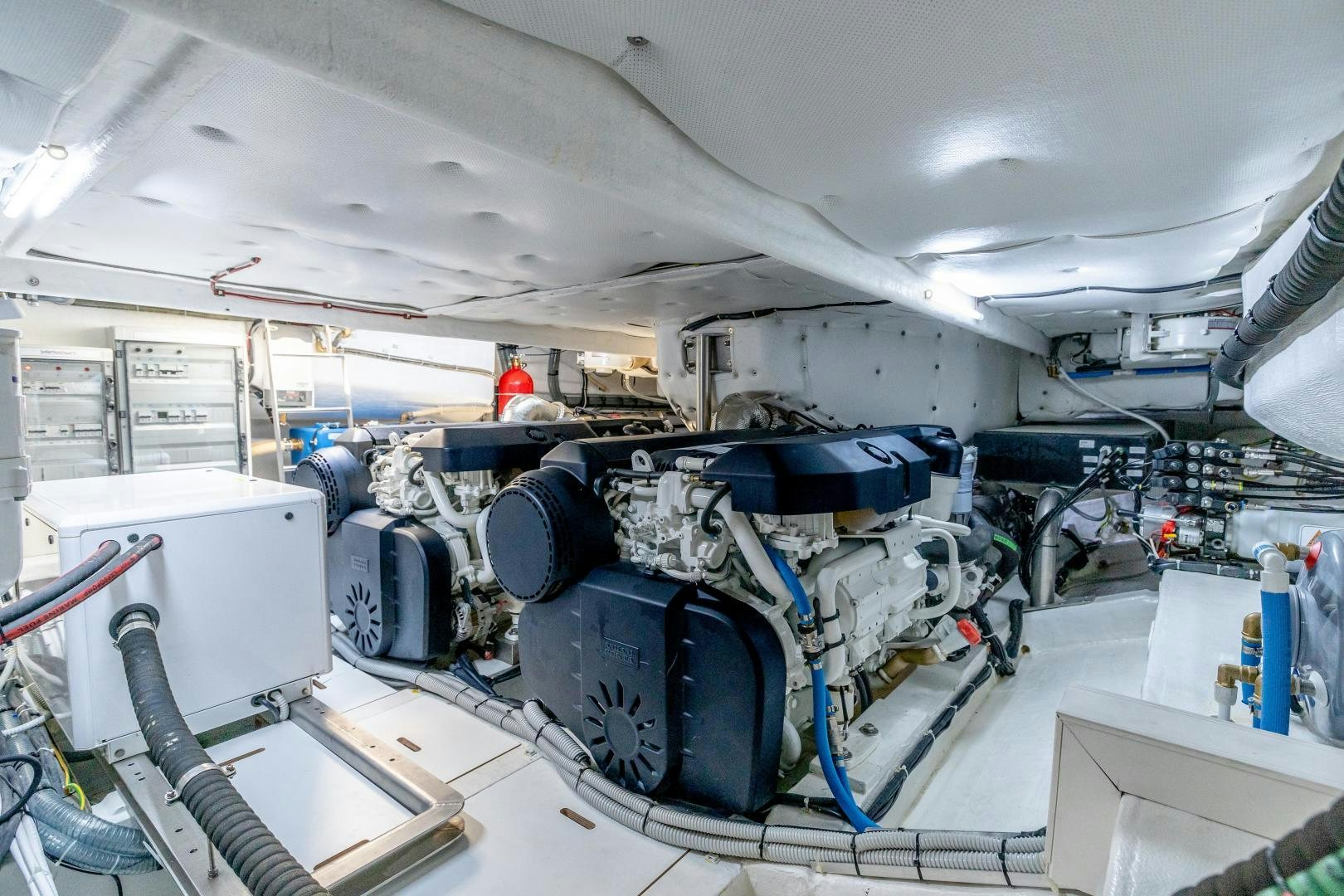 a white car with a large hood aboard CLAIR DE HUNE 2 Yacht for Sale