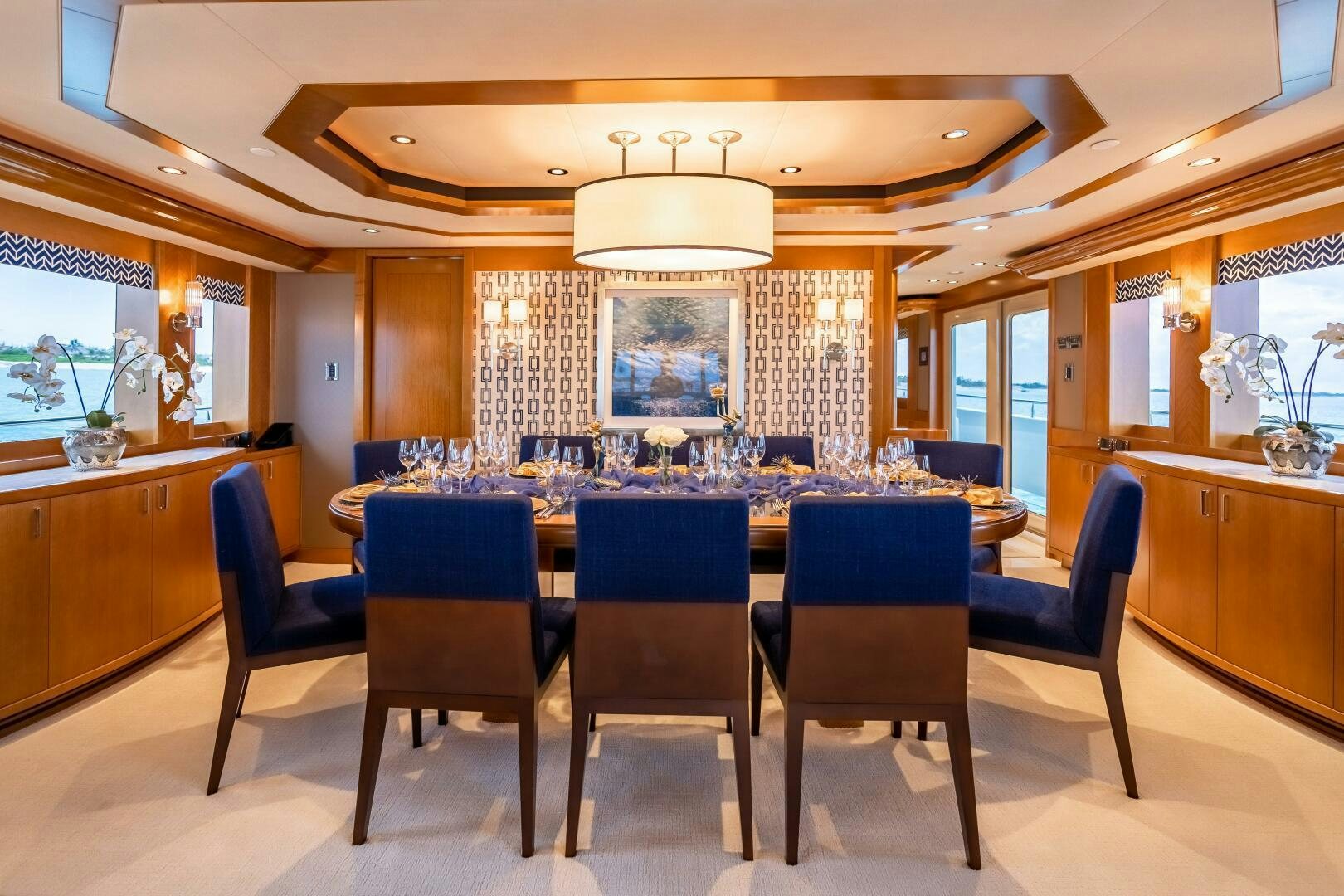 a room with a table and chairs aboard FAR NIENTE Yacht for Sale
