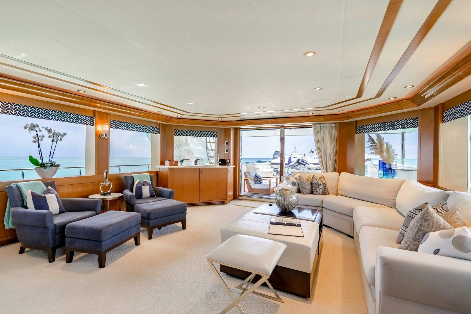 a living room with a large window aboard FAR NIENTE Yacht for Sale