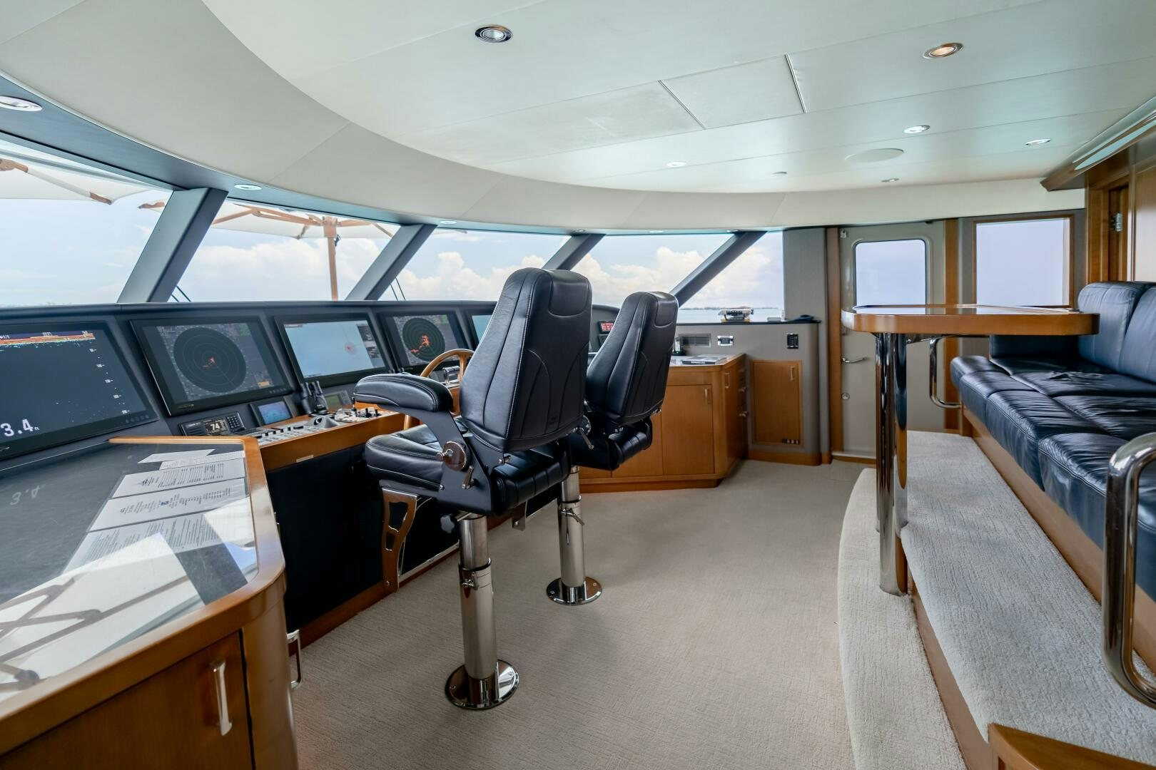 an empty office with a desk and chairs aboard FAR NIENTE Yacht for Sale