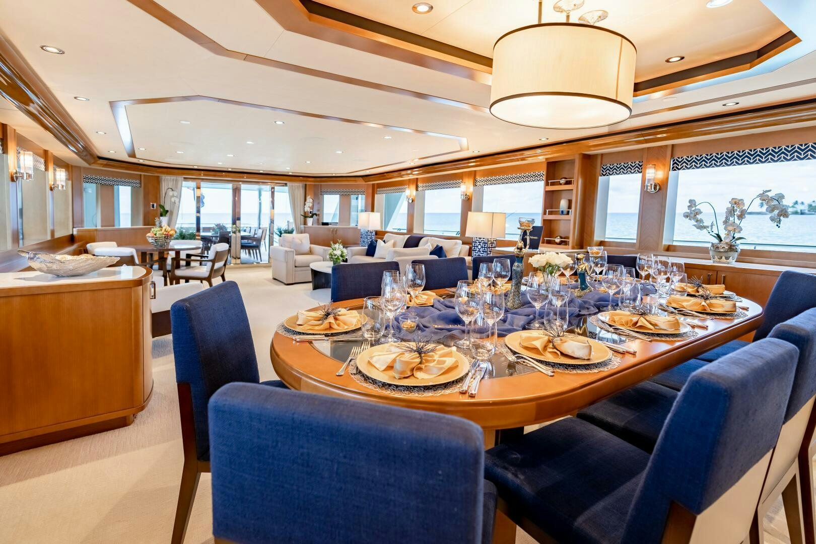 a large dining room with a large table and chairs aboard FAR NIENTE Yacht for Sale