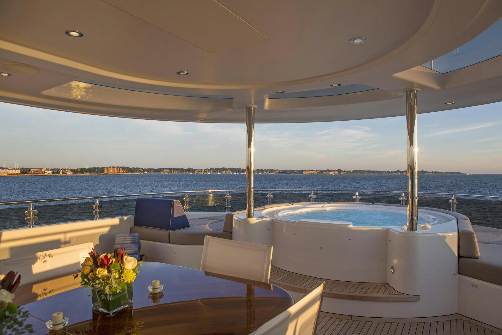 a room with a table and chairs aboard FAR NIENTE Yacht for Sale